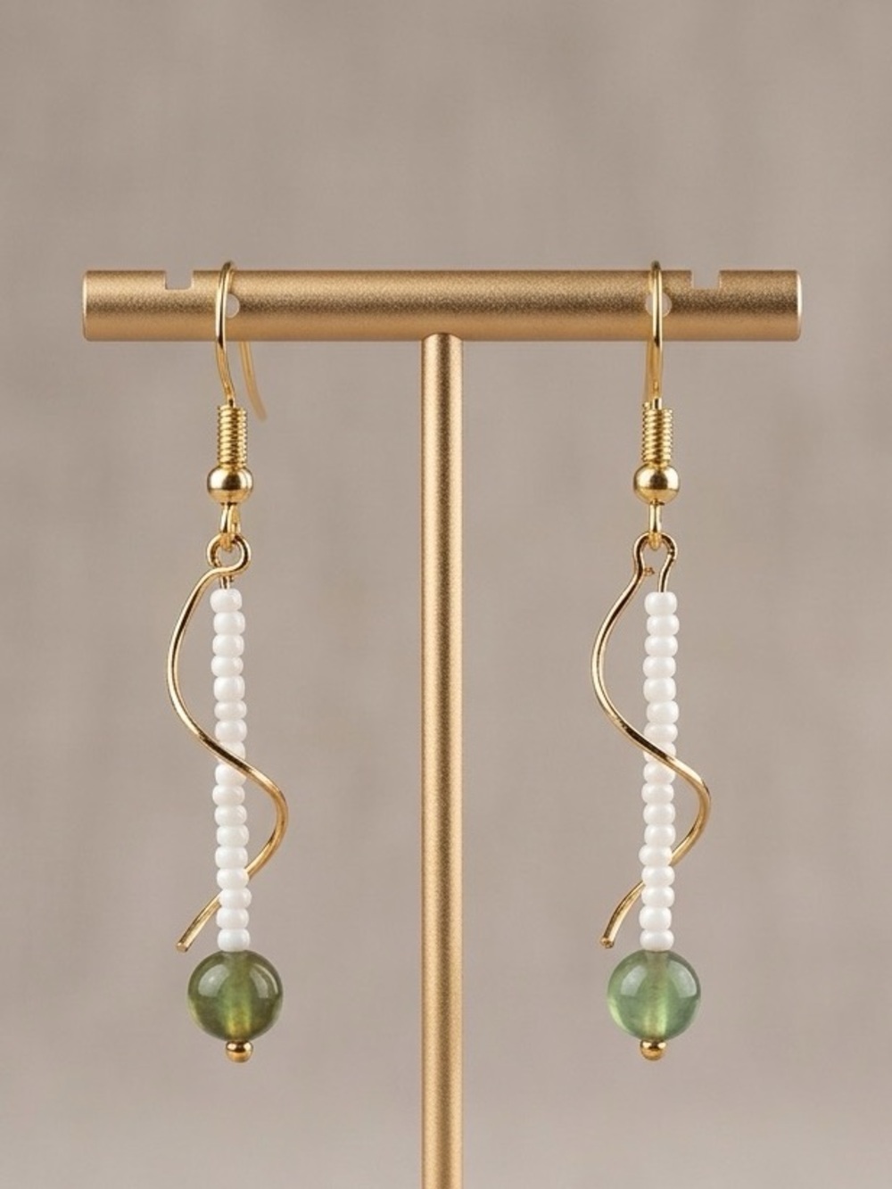 Dainty Drop Gold-toned Wavy Metal Design Adorned | White & Olive Grean Jade Bead
